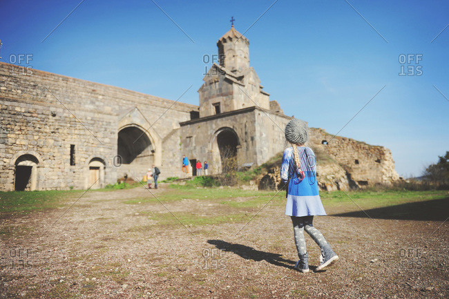 Girl outside an Armenian monastery