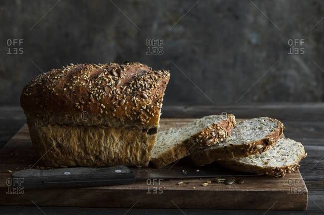 Loaf and slices of whole wheat bread