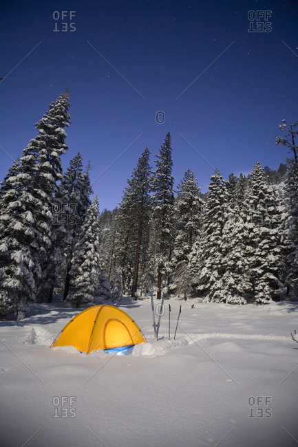 A snow camping tent among trees in South Lake Tahoe, California