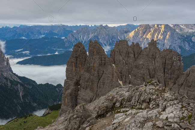 View to Cadini di Misurina mountains at sunrise on a cloudy day, Dolomites
