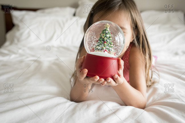 little girl snow globe