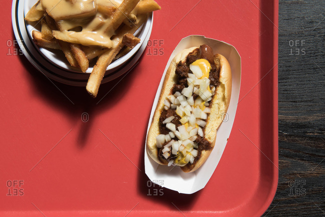 Hot dog and cheese covered French fries
