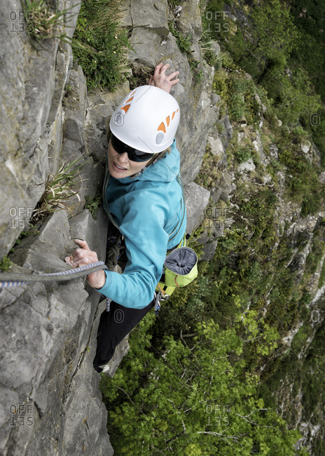 Woman rock climbing the Giant\'s Cave Buttress