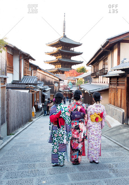 Women in kimonos near Japanese temple