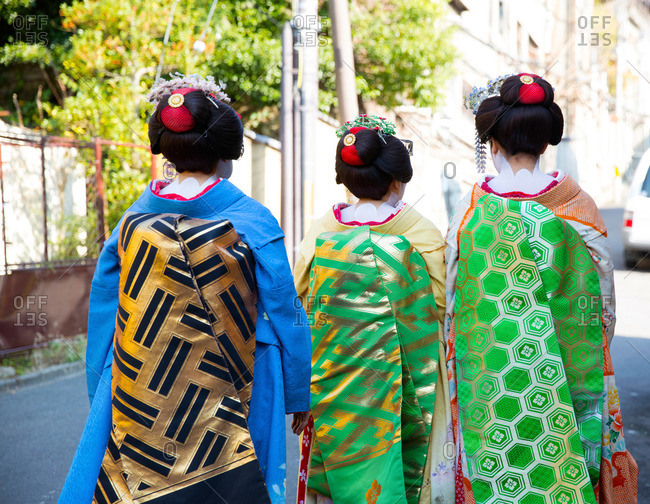 Geishas walking in Japanese street