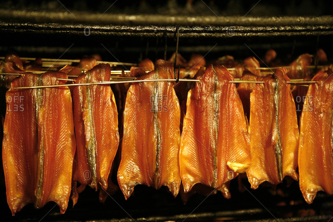 Close up of trout fish being smoked at the Weiss Family Smokery, Patagonia, Argentina