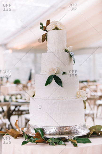 Floral cake in wedding reception hall