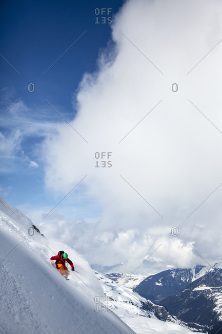 Skiing down a steep slope