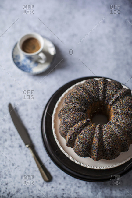 Lime poppy seed cake with a cup of coffee