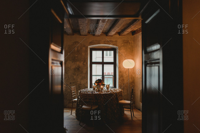 Table at a wedding reception through french doors