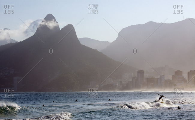 Surfers riding the waves at Rio de Janeiro