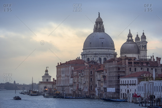 Sunrise at the Basilica of Santa Maria della Salute, as seen from the Academy Bridge, Venice,  Italy