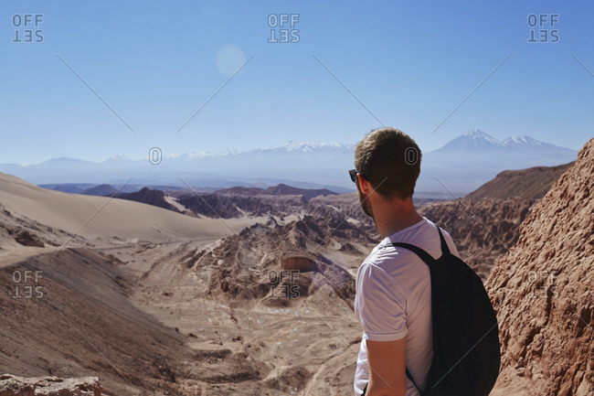 Hiker taking in the view of a desert valley
