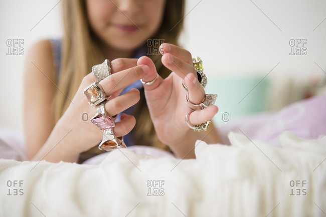 Girl wearing costume rings