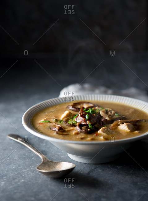 Steaming soup in a white bowl