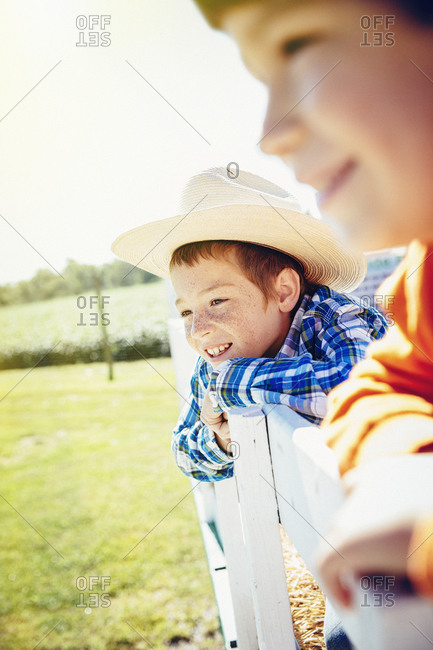 Children smiling on hay ride