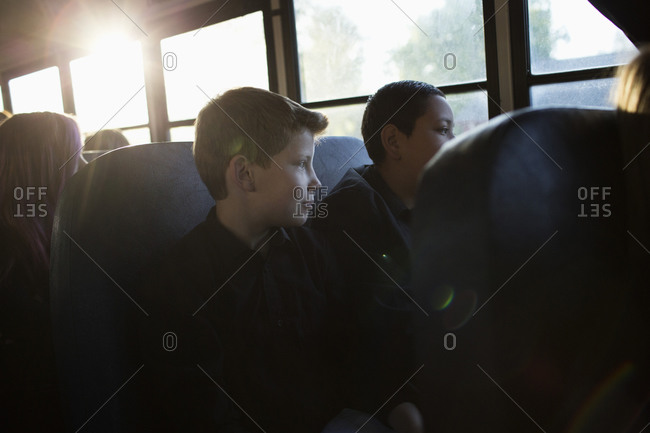 Students sitting on school bus