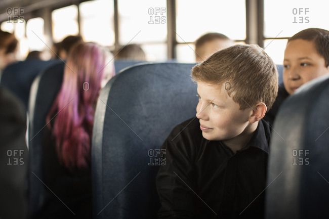 Students sitting on school bus