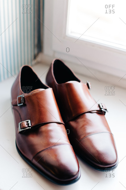Close up of men\'s brown leather dress shoes