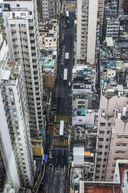 Hong Kong street crowded with high rise office and residential buildings