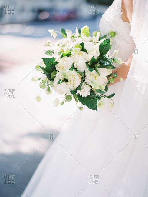 Close up of a bride holding a bouquet