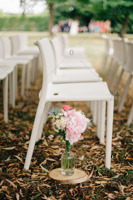 Wedding seating with flower arrangement in vase