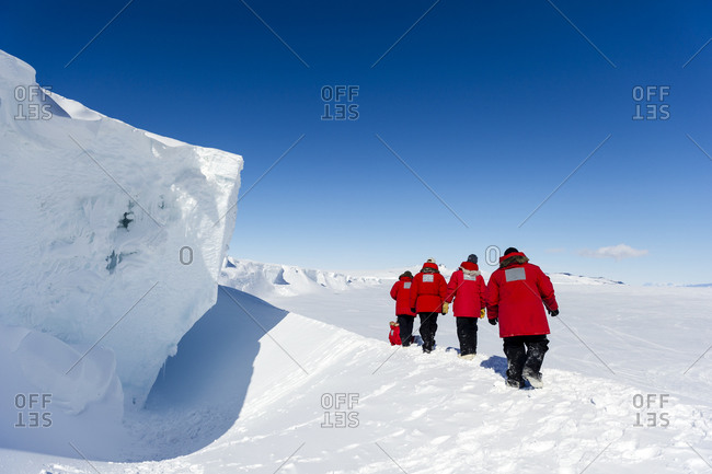 Staff from McMurdo Station exploring an ice cave in the Erebus Glacier Tongue