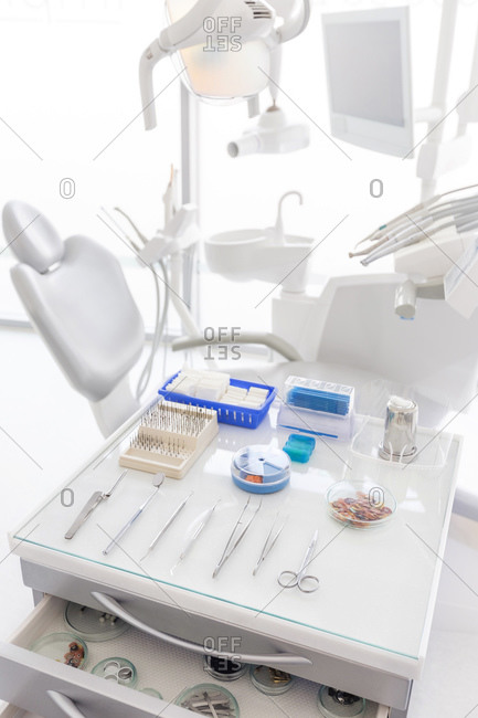 Dental clinic, empty dental surgery and dental instruments