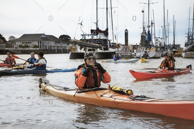 Kayakers in a harbor