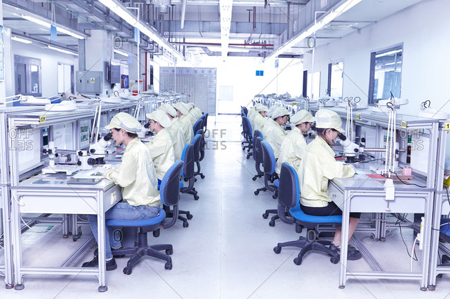 Quality check station at factory producing flexible electronic circuit boards