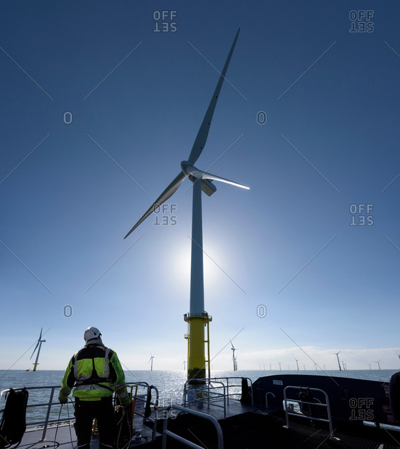 Worker on tender service ship on offshore windfarm