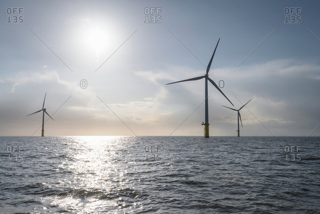 View of offshore windfarm from service boat in the sea