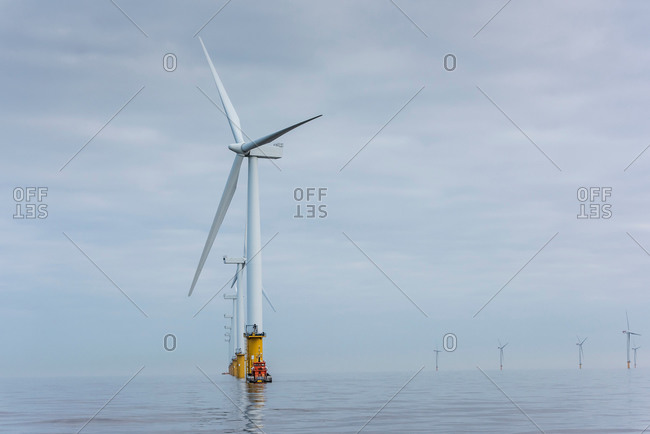 View of offshore windfarm from service boat at sea