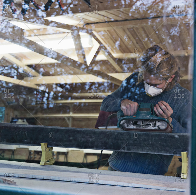 Man working in ski making workshop