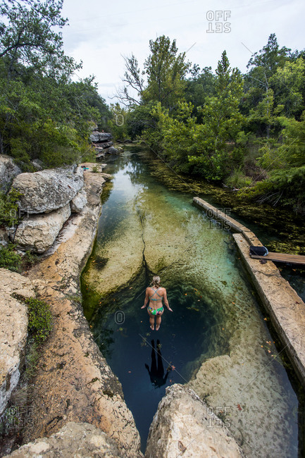 Jacob\'s Well near Wimberley, Texas is a unique geological feature and a great way to pass a hot summer day in Texas.