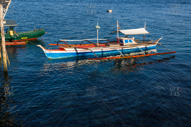 Traditional paraw boat in the water, Philippines