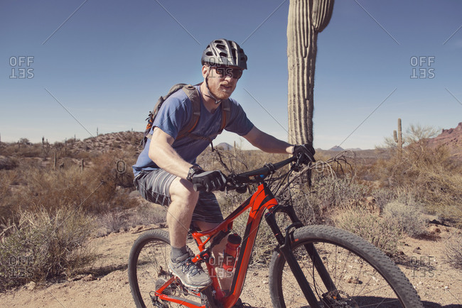 Man riding a mountain bike in the desert