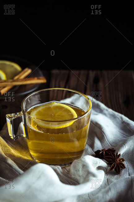Hot drink with lemon, cinnamon, and star anise