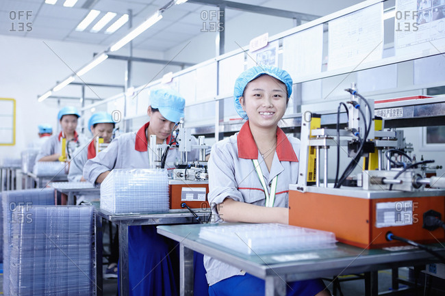 Workers at e-cigarettes battery factory, Guangdong, China