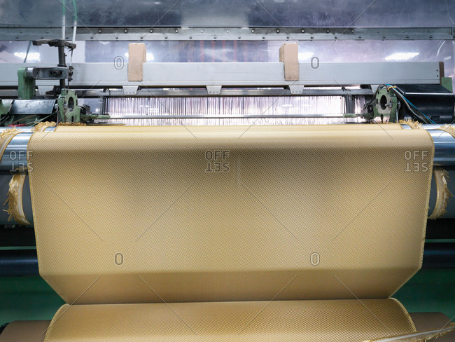 Loom weaving kevlar fabric in carbon fibre factory