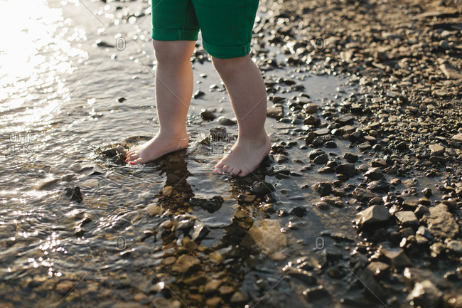 Child\'s feet in water