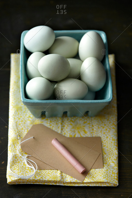 Chicken eggs, chalk, tag, kitchen towel