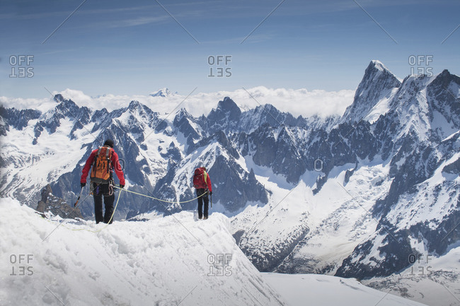 Caucasian skiers walking on mountaintop, Mont Blanc, Chamonix, France