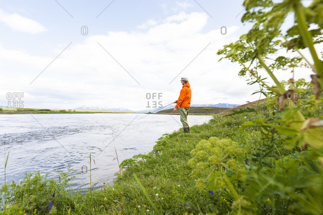 Man fly fishing on the river Horga, North Iceland
