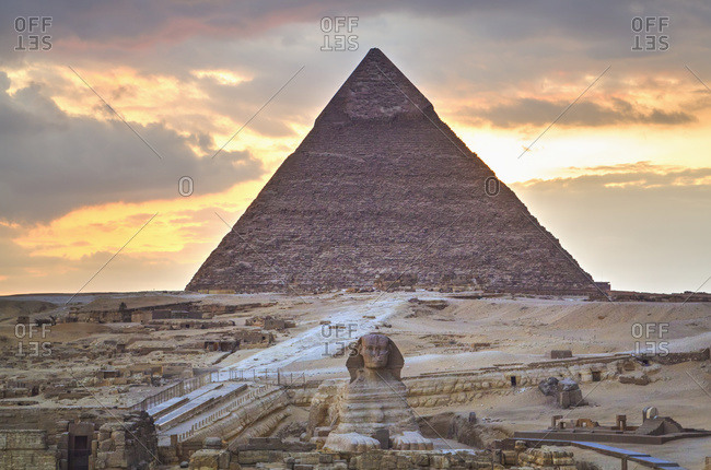 Sunset, Sphinx (foreground), The Pyramid of Chephren (background), The Pyramids of Giza; Giza, Egypt