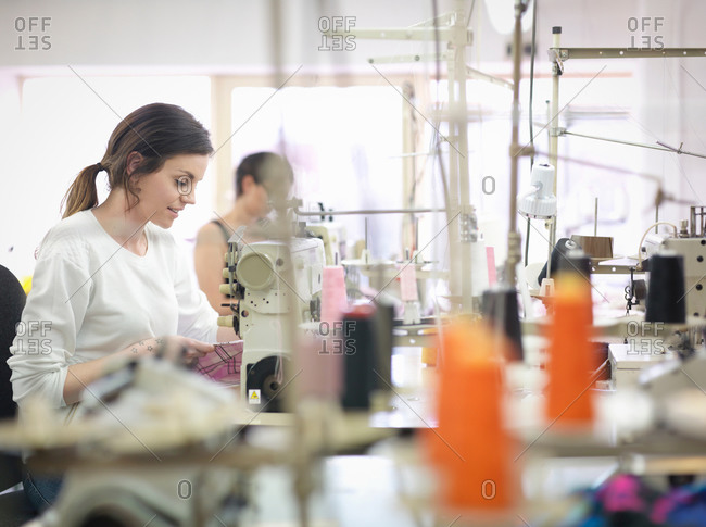 Female garment worker in clothing factory