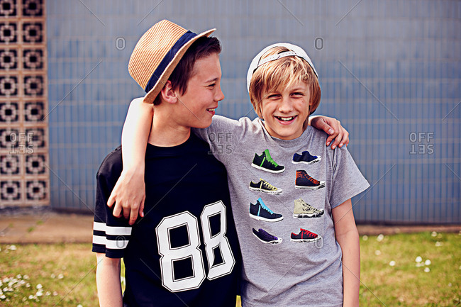 Two boys with arms around each other, portrait