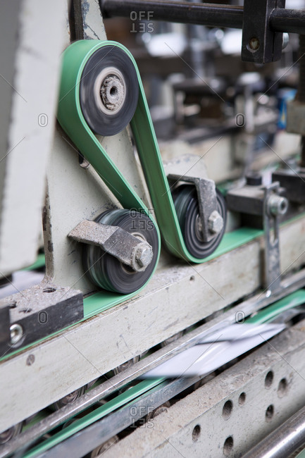 Close up of machine in cardboard factory