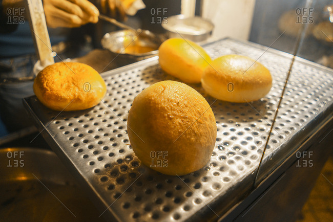 Bread rolls on street food vendor\'s stand in Morocco