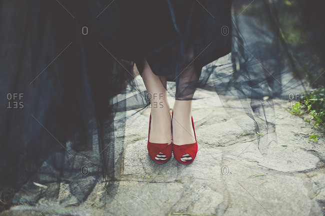 Bride with black dress and red shoes